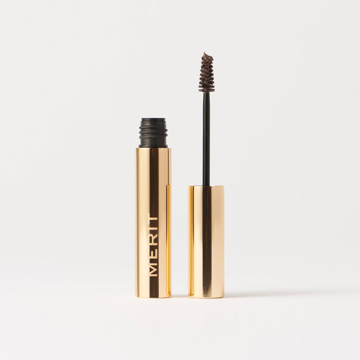 Dark Brown | | Brow pomade with gold packaging on a white background