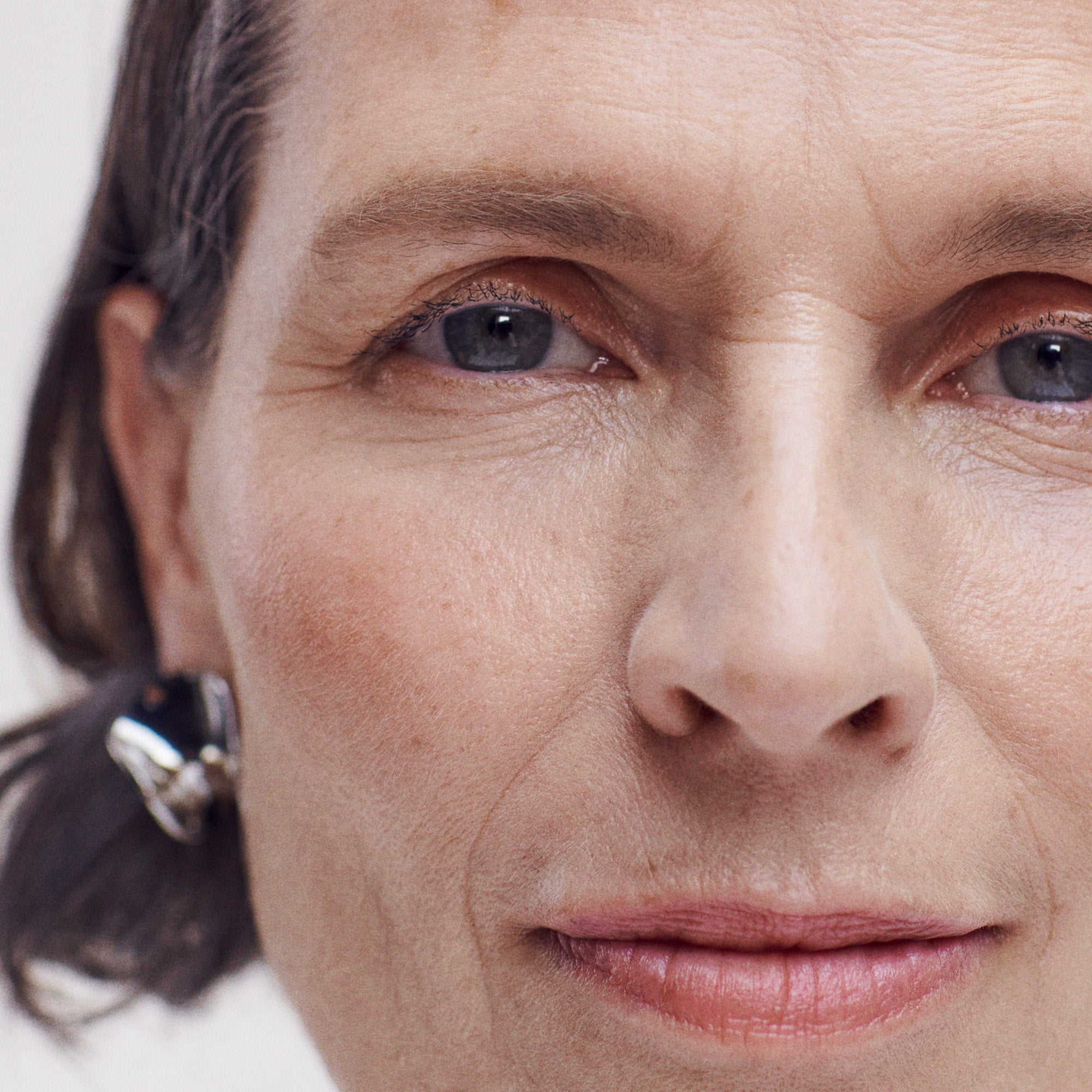 Taupe | face | Model is wearing Brow 1980 and Brow 1990 in Taupe