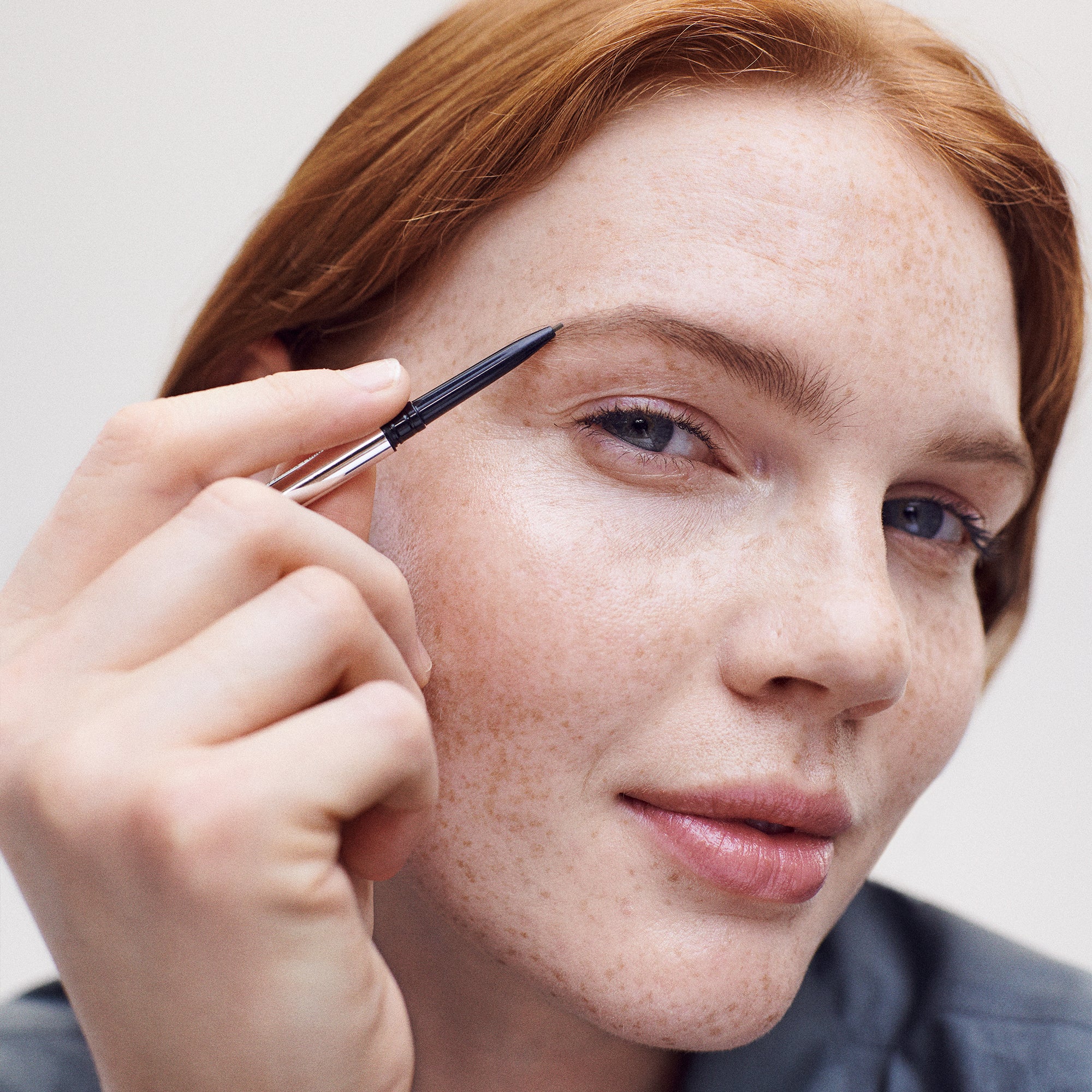 Master || Model is applying brow 1990 in shade light brown