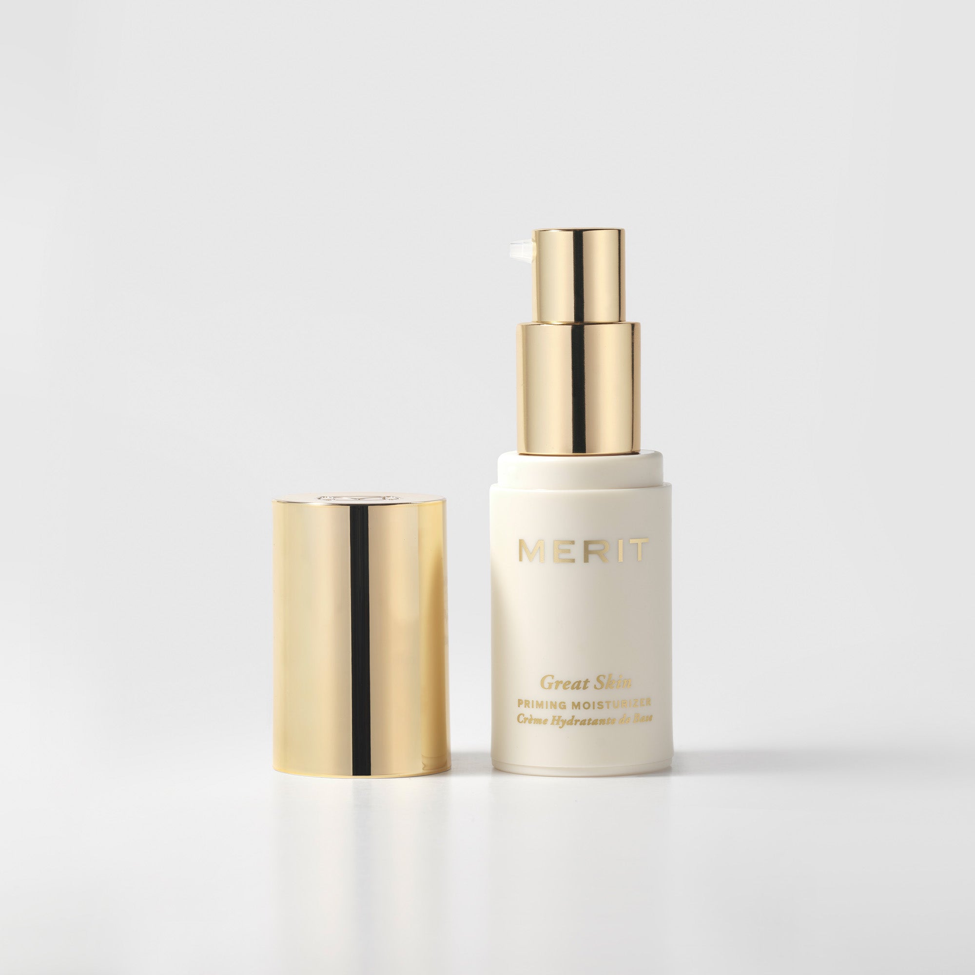 Master || Bottle of Great Skin Moisturizer with gold colored cap and gold writing 