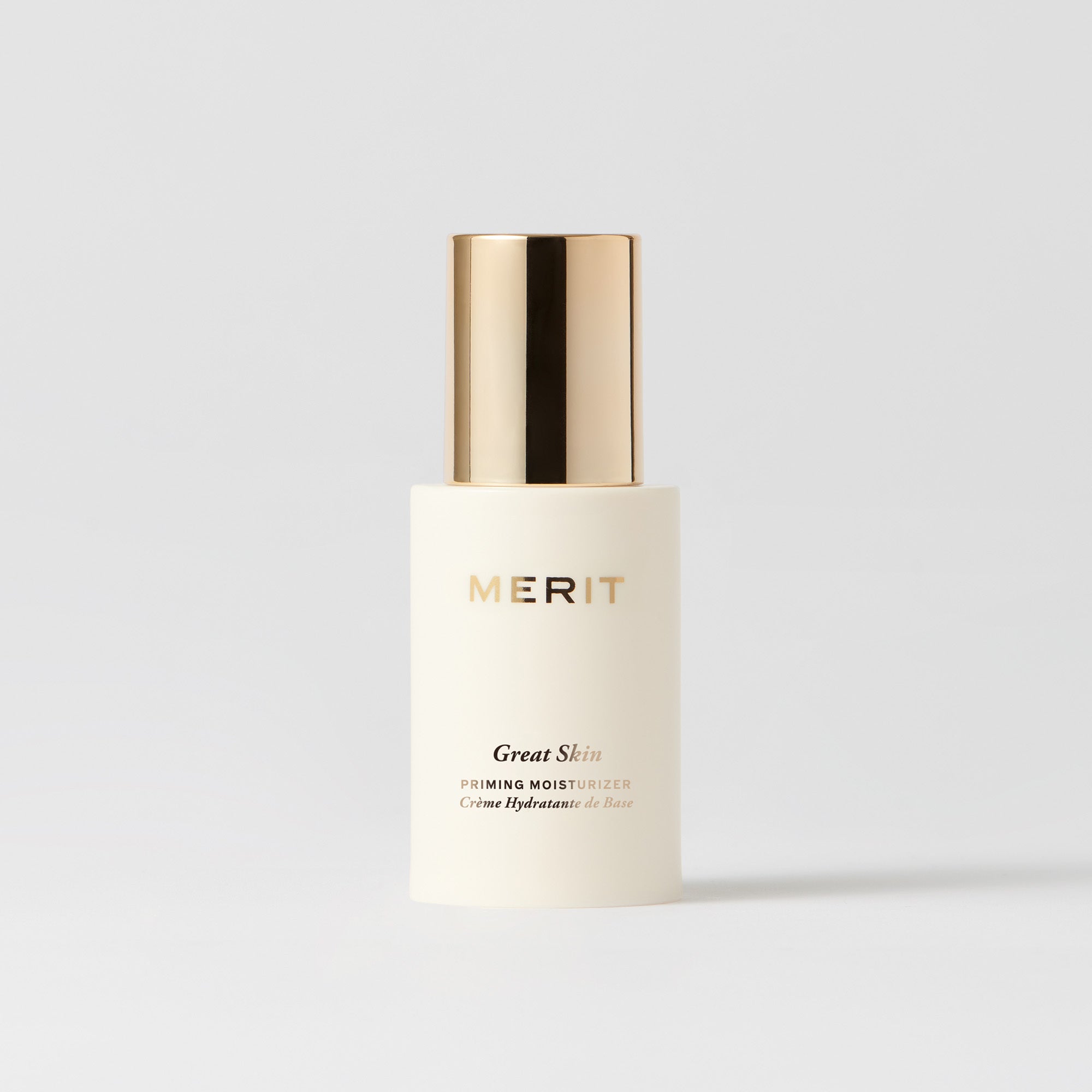 Master || Bottle of Great Skin Moisturizer with gold colored cap and gold writing 
