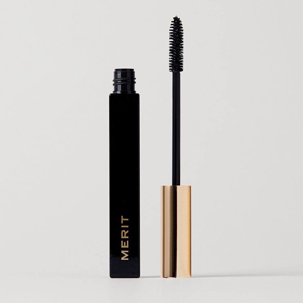 Master ||  Clean Lash Mascara with Mascara wand next to open tube