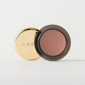 Master || A cream-to-powder eyeshadow by MERIT Beauty in Studio.