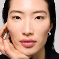 Master || Close-up of a woman's face with wearing the Uniform in Shade 24