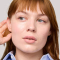 Master || Close-up of a woman's face with wearing the Uniform in Shade 30