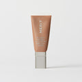 Master || A tube of MERIT brand mineral sunscreen with a sheer tint finish, providing broad spectrum 50 UVA/UVB protection, displayed against a white background.
Shade 10