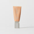 Master || A tube of MERIT brand mineral sunscreen with a sheer tint finish, providing broad spectrum 45 UVA/UVB protection, displayed against a white background. Shade 22