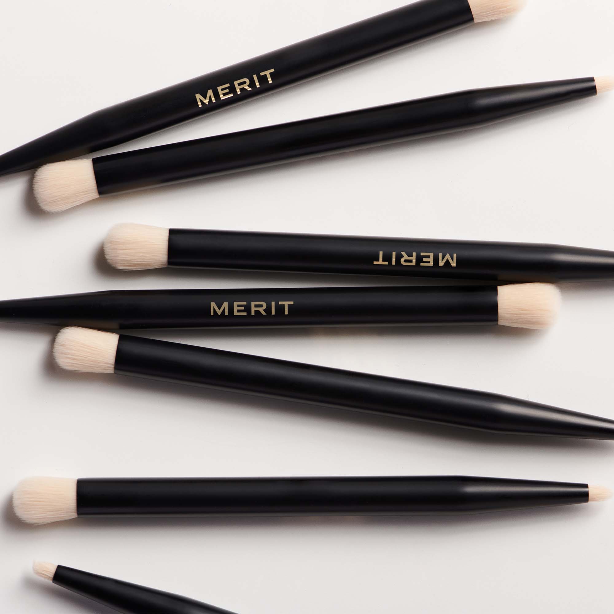 Master | | 7 Brush No. 2s laying flat on a white background