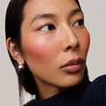 Master || Model is wearing Flush Balm in shade Après.