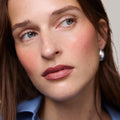 Master ||  Model is wearing Flush Balm in shade Archival.