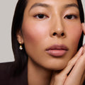 Master || Model is wearing Flush Balm in shade Beverly Hills.