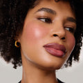 Master || Model is wearing Flush Balm in shade Cheeky.