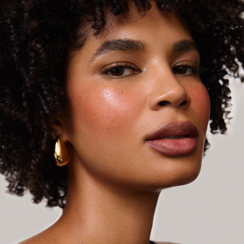 Fox | face::deep | Model is wearing Flush Balm in shade Fox