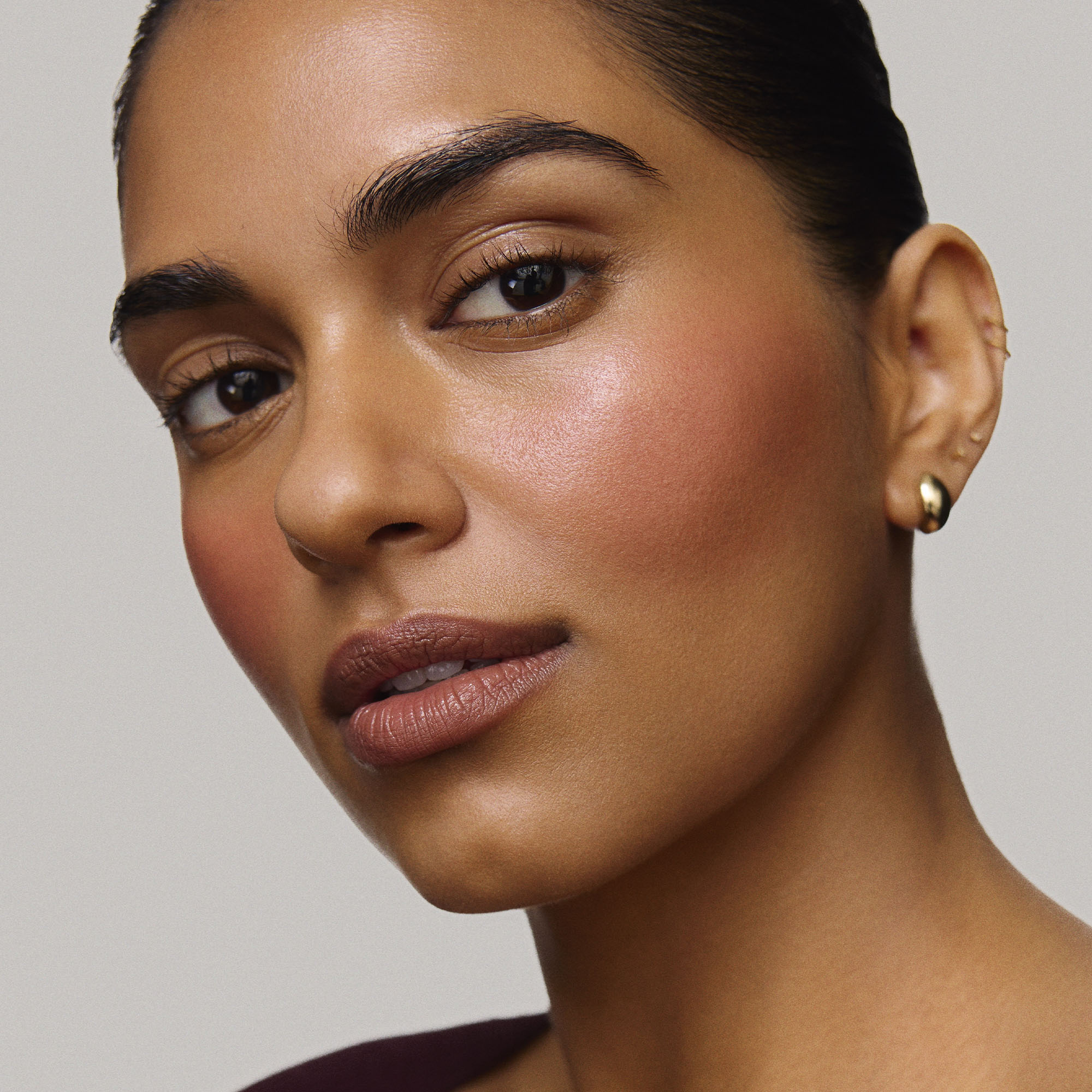 Fox | face::medium | Model is wearing Flush Balm in shade Fox