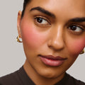 Master || Model is wearing Flush Balm in shade Le Bonbon.