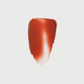 Persimmon | swatch | Swatch of flush balm in Persimmon.
