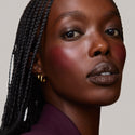 Rouge | face::rich | Model is wearing Flush Balm in shade Rouge