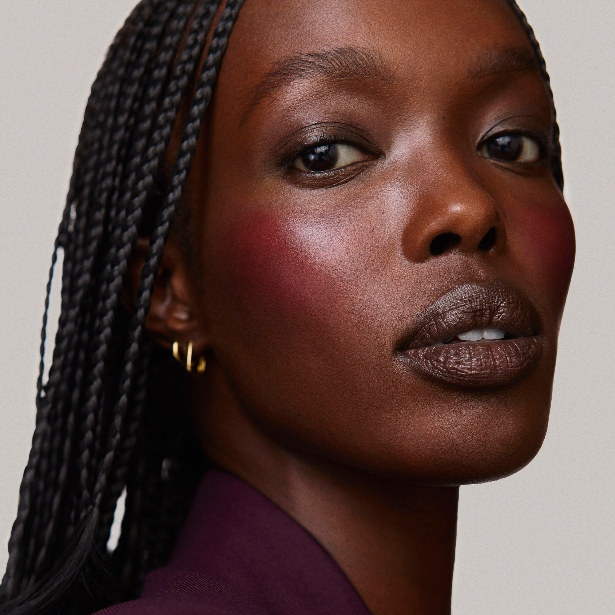 Rouge | face::rich | Model is wearing Flush Balm in shade Rouge