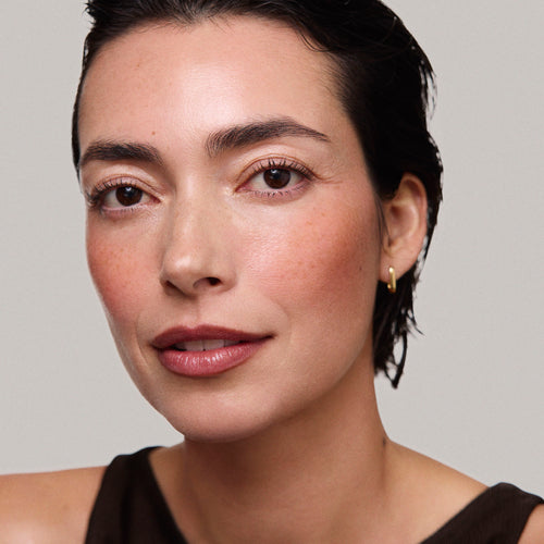 Master || Model is wearing Flush Balm in shade Terracotta