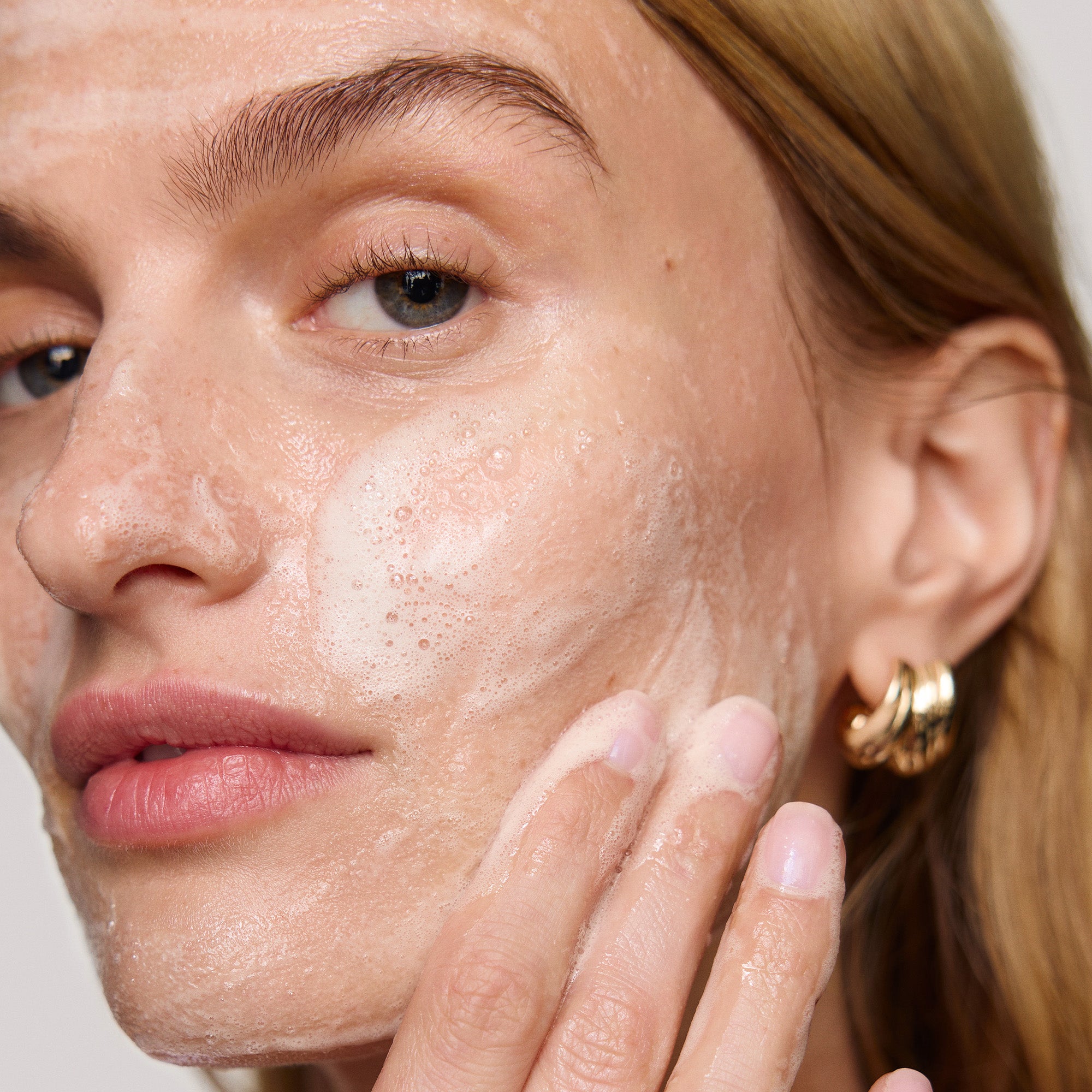 Master || Model is washing her face with great skin double cleanse