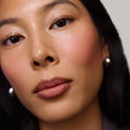 Model wears Signature Lip Liner in Shade Sportif