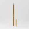 Master || A gold-colored lip liner pencil with its cap removed, displayed against a white background in shade Tabac