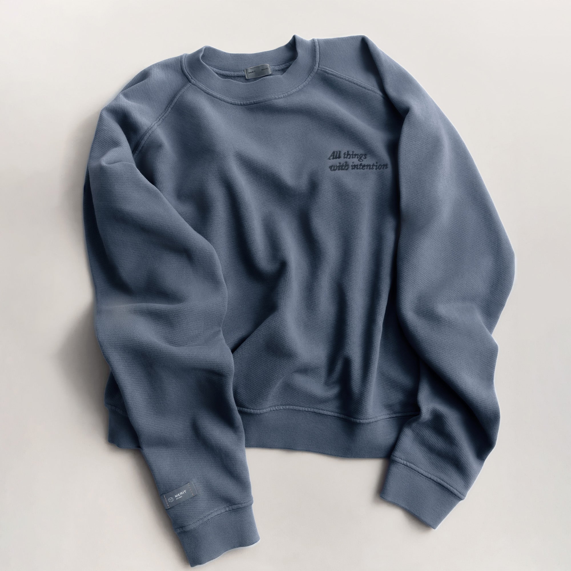 Master || The Anniversary Sweatshirt with "All things with intention" on it.