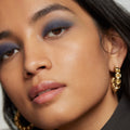 Midnight | face::medium |  Model is wearing Solo Shadow in Shade Midnight.