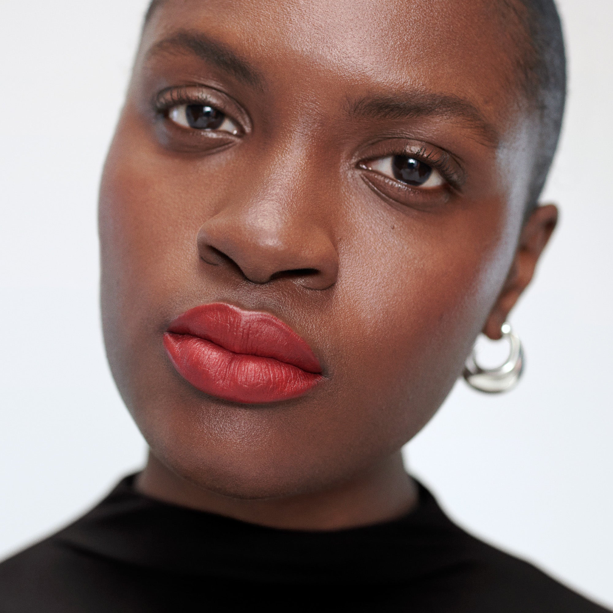 Vermillion | face::deep | Madeline wears Signature Lip in Vermillion