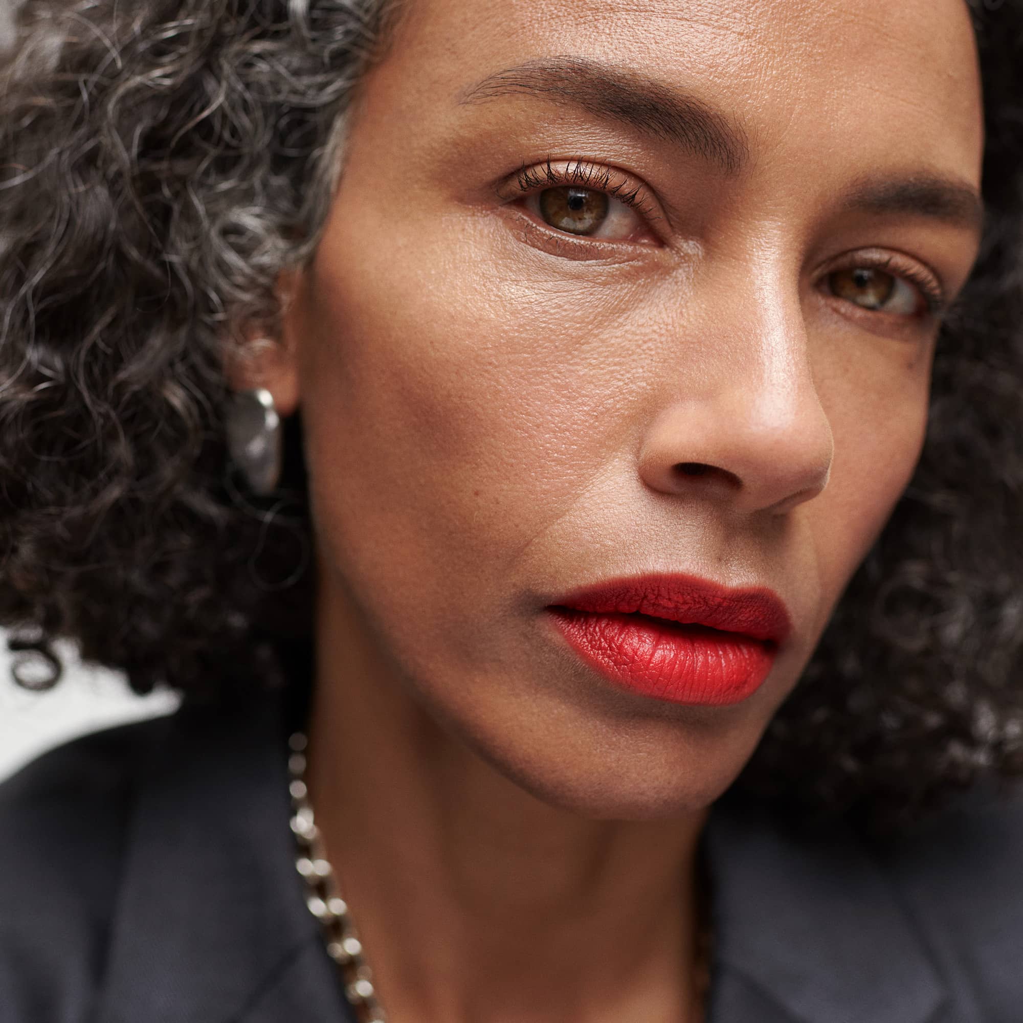 Vermillion | face::deep | Stephanie wears Signature Lip in Vermillion