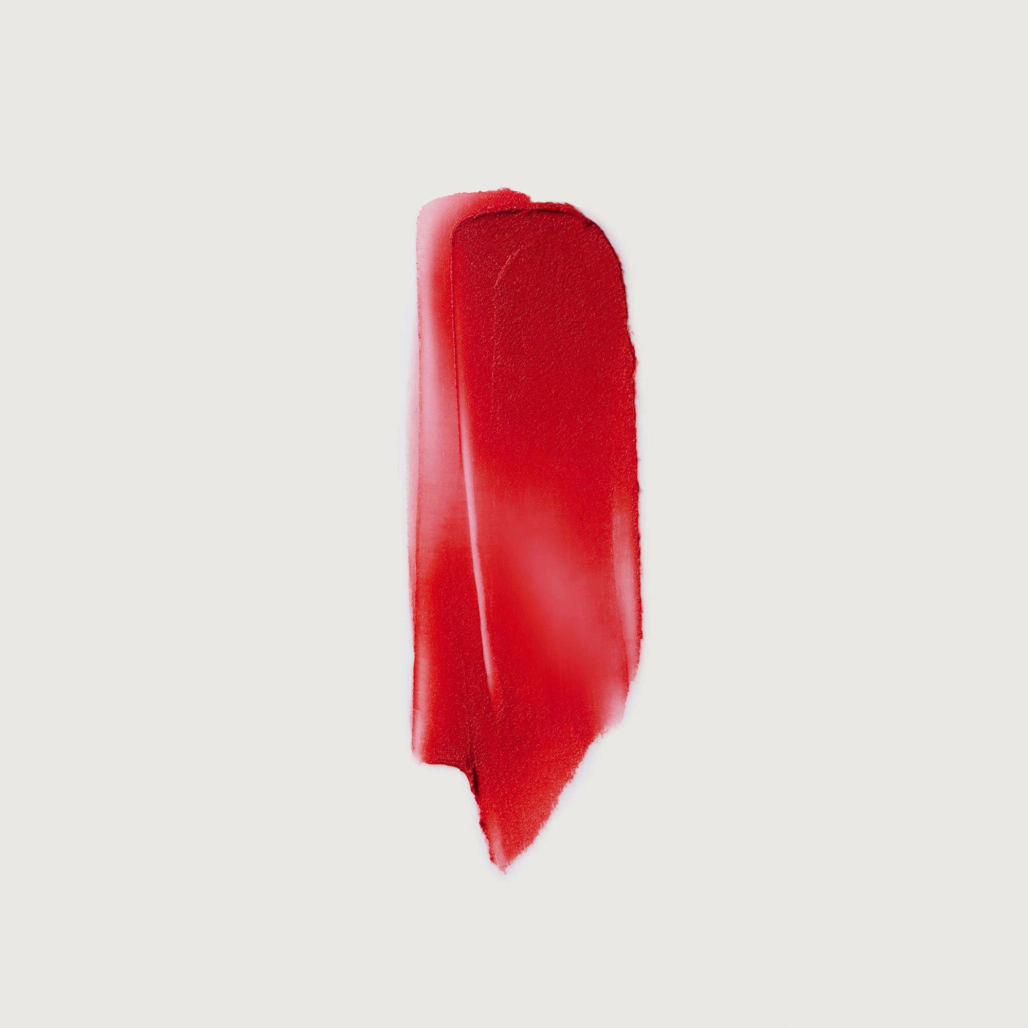 Vermillion || Swatch of signature lipstick in shade Vermillion