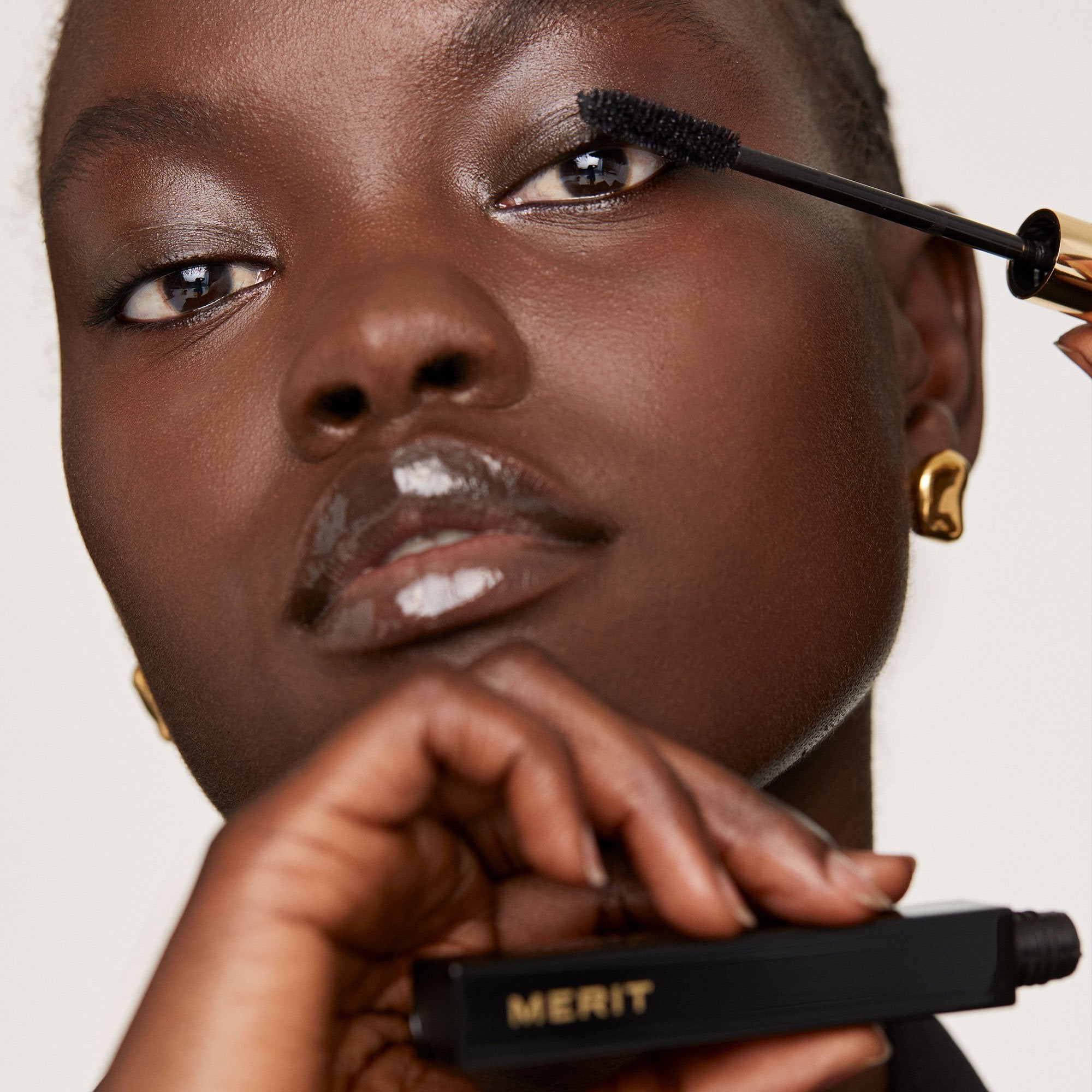 Master | | Image of Model applying clean lash Mascara