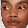 1990 | face::deep | Farhiya wears Signature Lip in 1990
